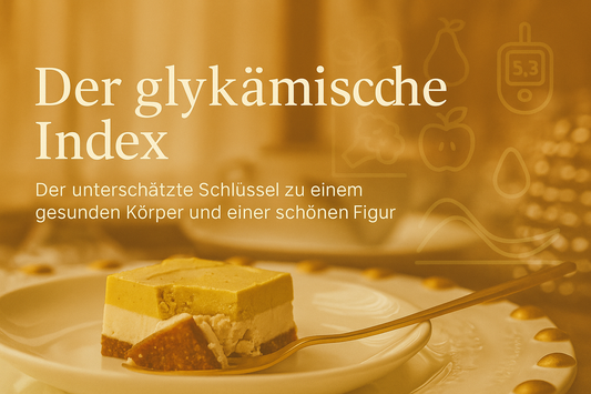 Elegant layered raw dessert with golden top layer, cream middle, and dark base on white plate, styled for healthy living blog post about glycemic index and natural sweets